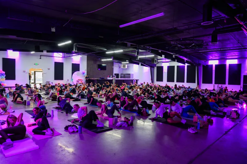 Pilates & Petals: Flow Into Spring in Orem, Utah (Luna Event Venue) — a room full of people at Abby's pilates event